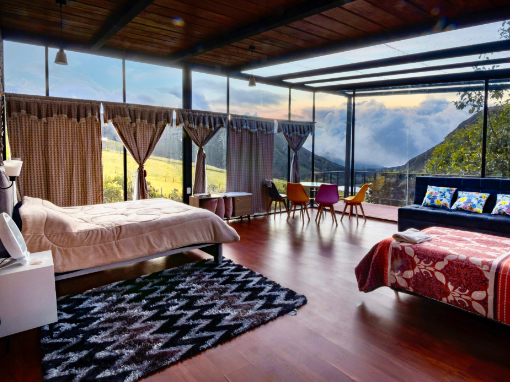 Family Room with views interior 2 Family room with King bed, Queen bed, sofa bed, and table and chairs with a stunning view.