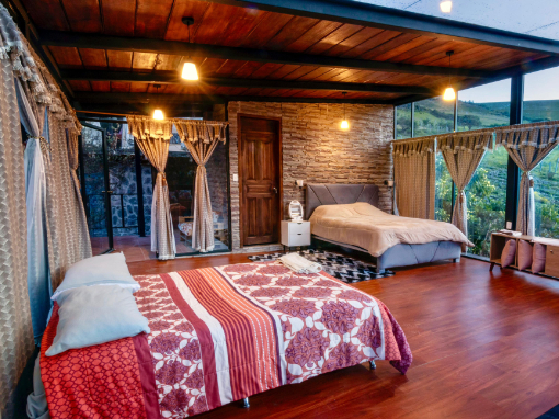 Family Room with vista interior King bed and Queen bed make for comfortable sleeping in the family room at Tambo Condor
