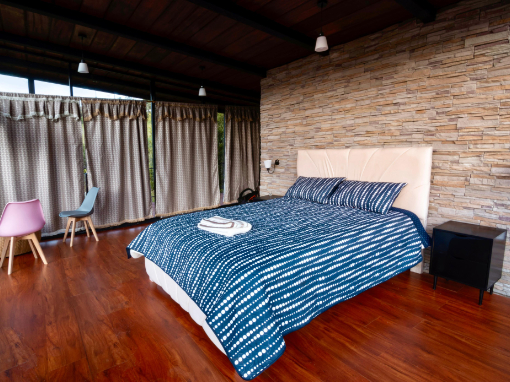 King bed in family room King bed in family room at Tambo Condor