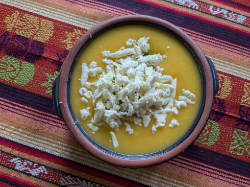 Locro de Papas, Potato Soup with Cheese Creamy golden Ecuadorian potato soup topped with grated fresh cheese.