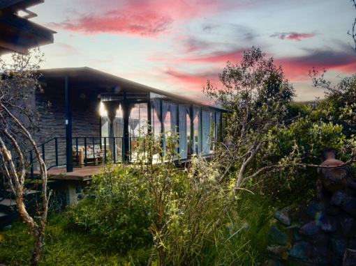 Sunset at Tambo Condor A spacious guest room with wide windows to take in the sunset views at Tambo Condor.